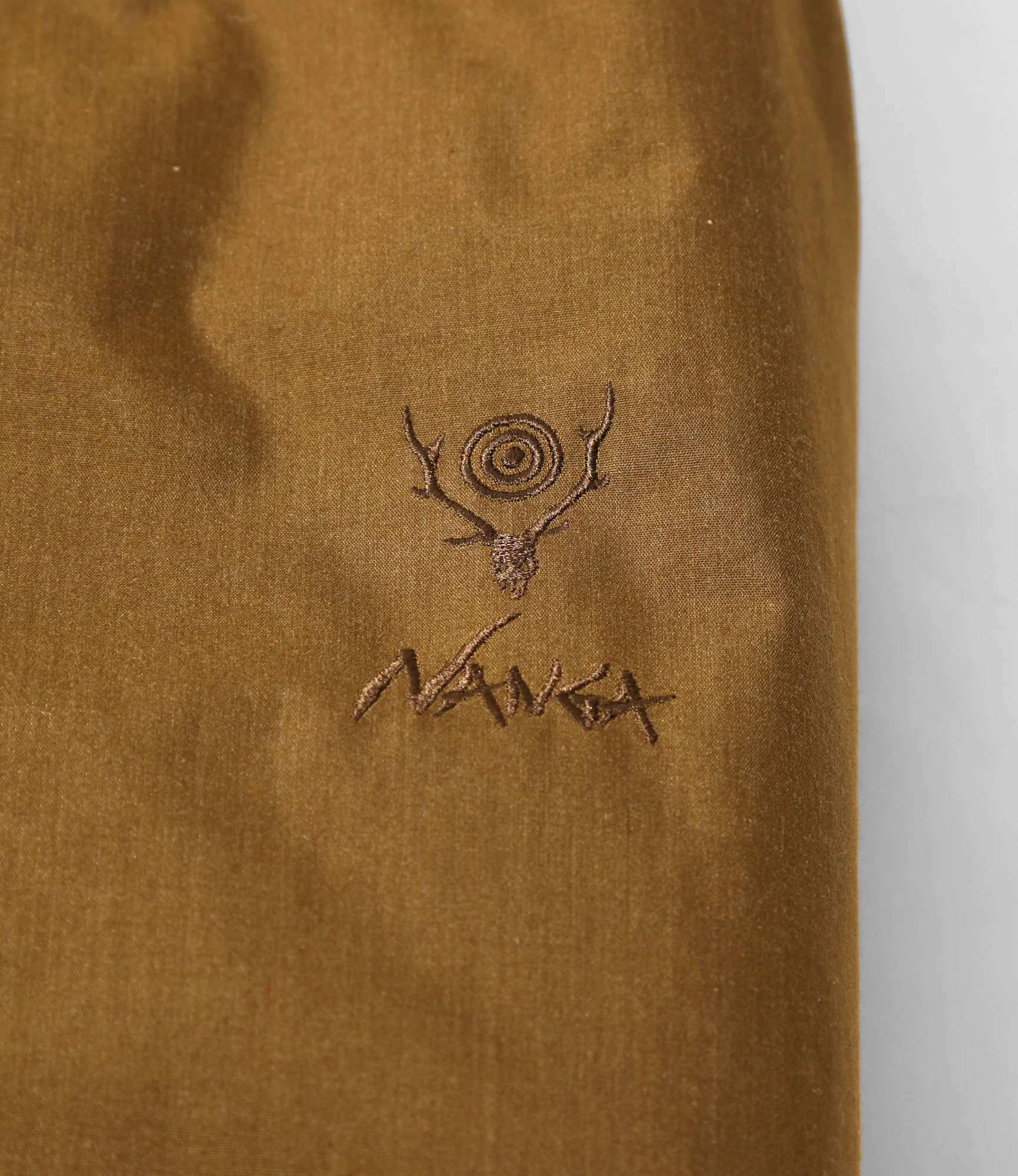 South2 West8 x NANGA Tenkara Jacket - Coyote - HINOC - Image 8